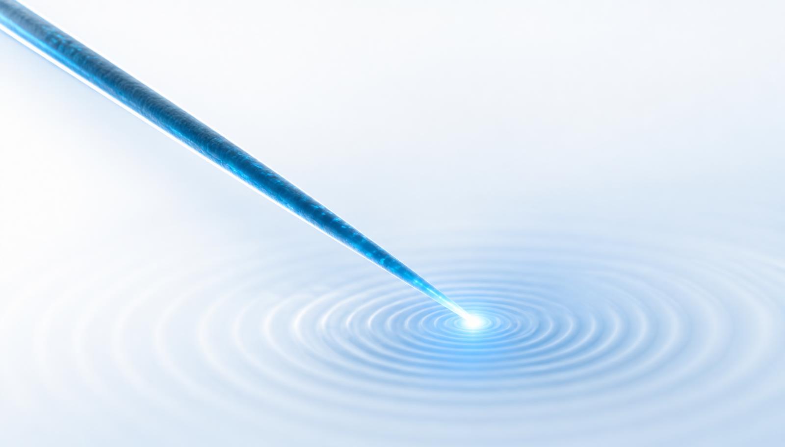 Abstract visualization of a nanoprobe tip emitting a point of light over concentric rings